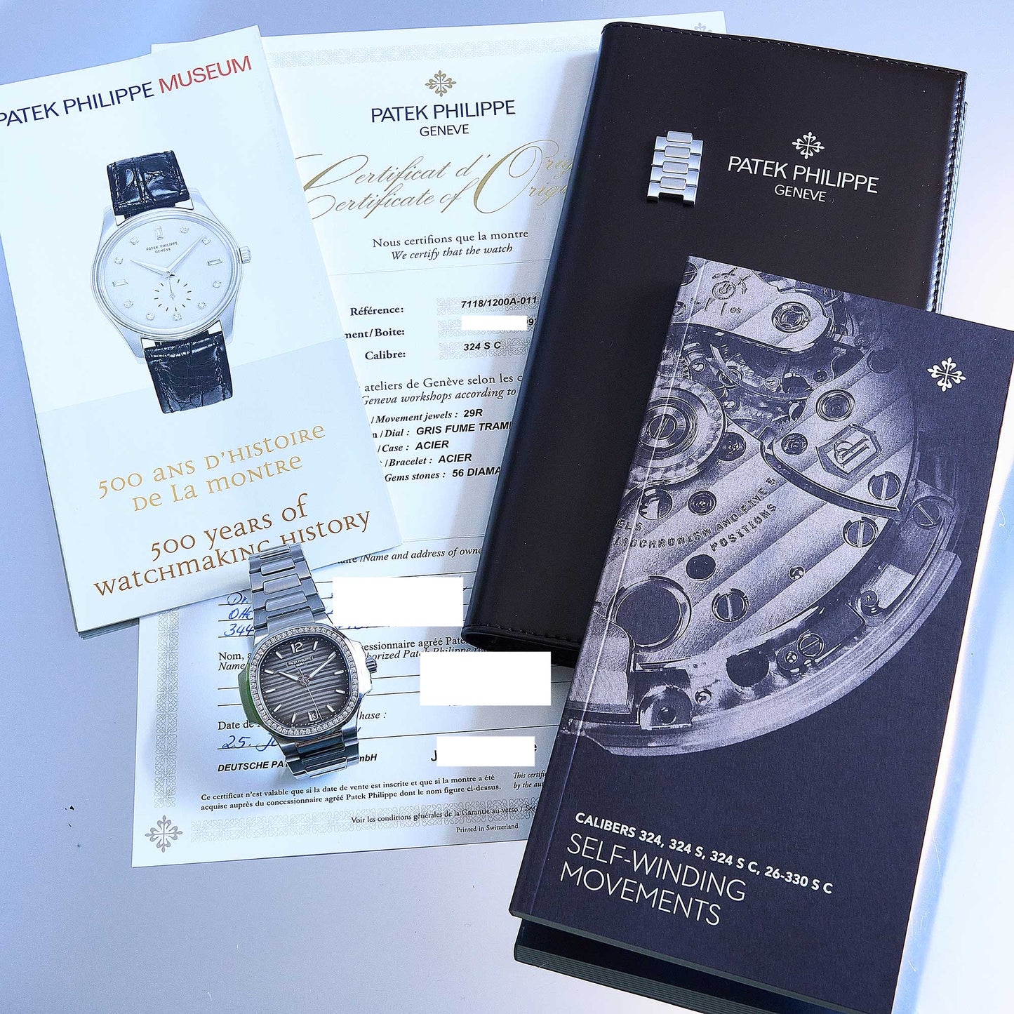 Patek Philippe Nautilus Ref. 7118/1200A-011 - "Very good" condition - German first owner - Fullset