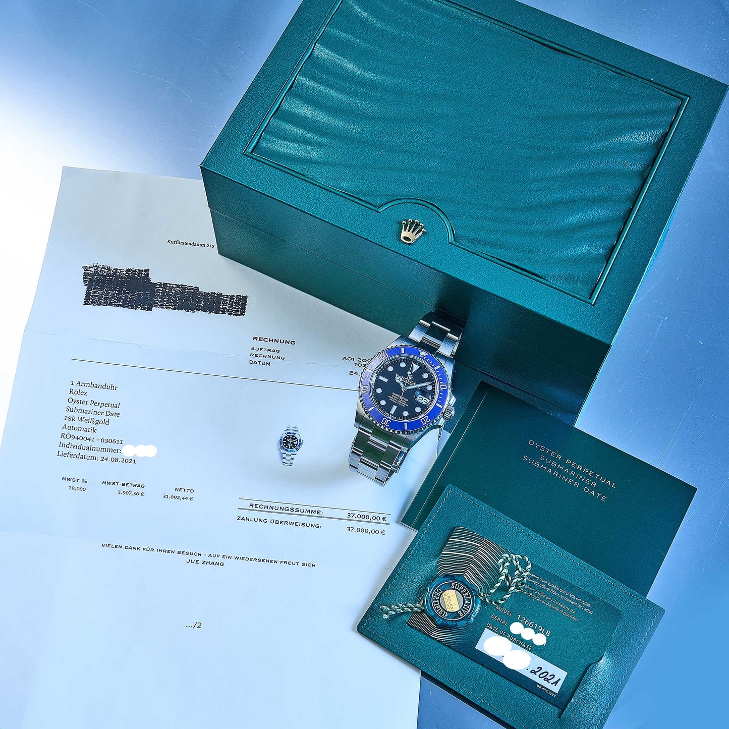 Rolex Submariner Date Ref. 126619LB - "Very good" condition - German fullset