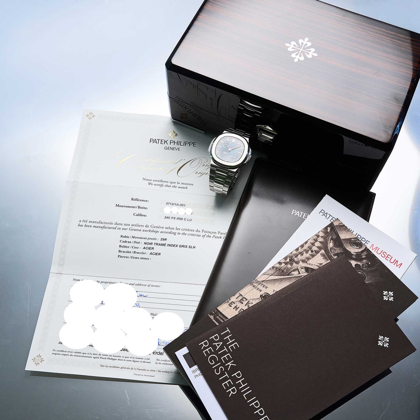 Patek Philippe Nautilus Ref. 5712/1A-001 - "Very good" condition - German Fullset